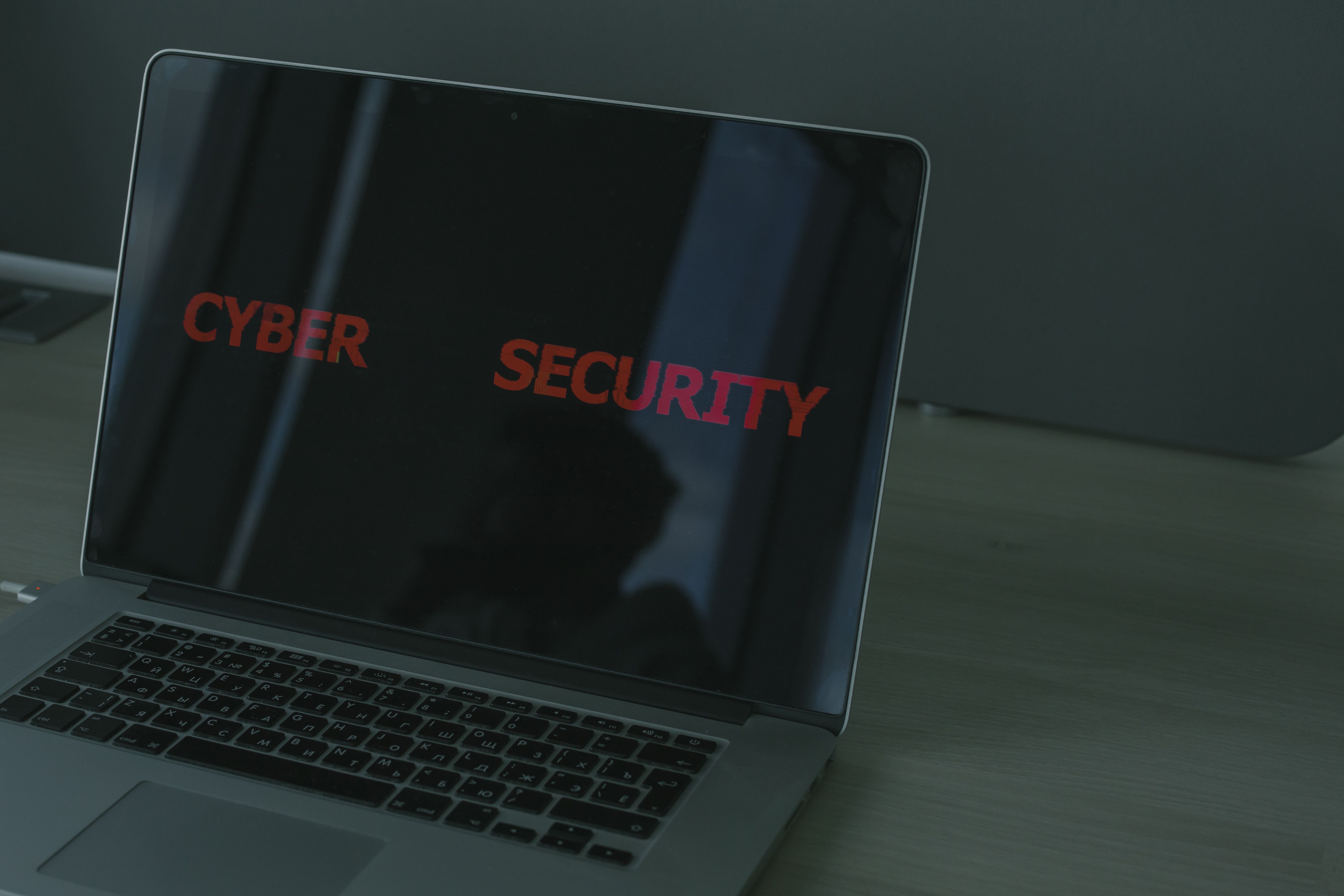 Close-up of a laptop screen showing cybersecurity interface